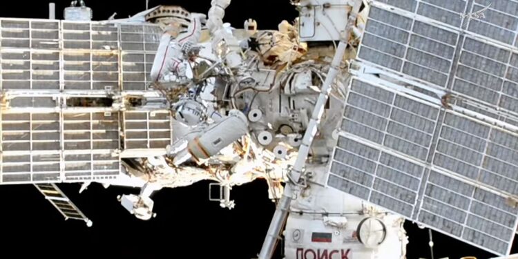 Russian cosmonauts install semiconductor experiment, jettison old HDTV camera during spacewalk outside ISS