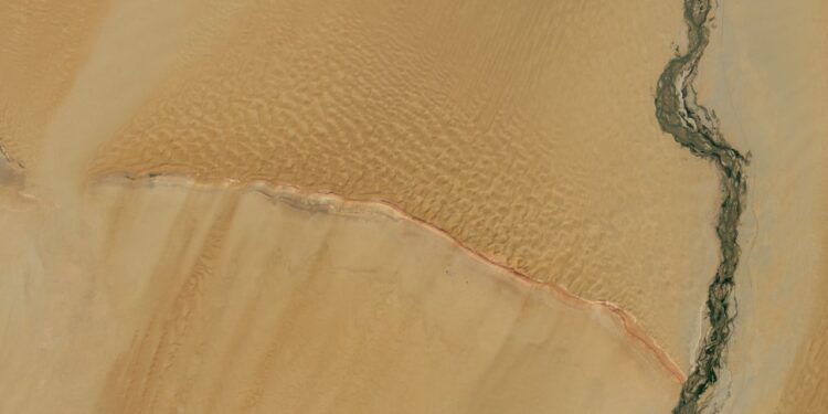 Where the ridge meets the river | Space photo of the day for Oct. 16, 2025