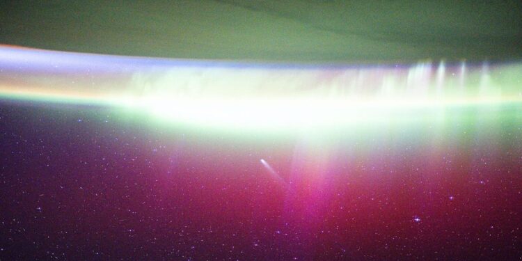 ISS astronauts see comet Lemmon ‘absorbed’ by aurora | Space photo of the day for Nov. 20, 2025