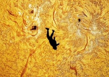 ‘It was an incredible moment.’ Skydiver plunges across the face of the sun jaw-dropping astrophotographer photo