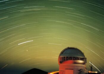 Star and satellite streaks in a green night sky | Space photo of the day for Nov. 12, 2025