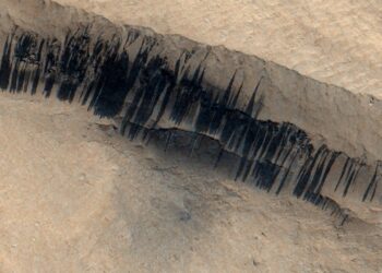 Mars orbiter spies ‘barcode’ aftermath of rare Red Planet avalanche caused by meteoroid impact