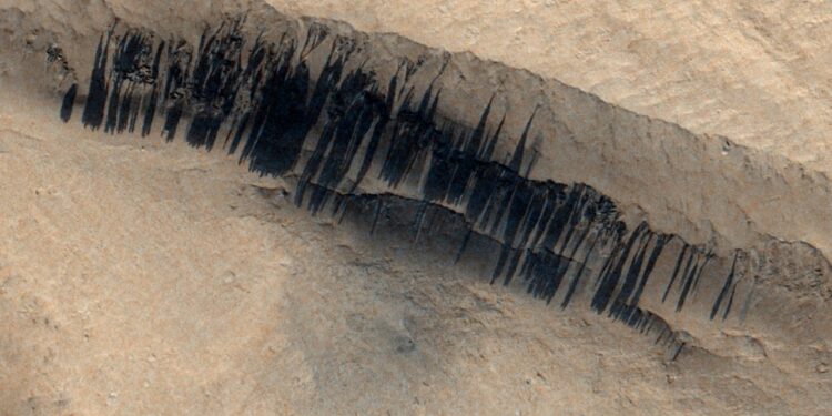 Mars orbiter spies ‘barcode’ aftermath of rare Red Planet avalanche caused by meteoroid impact