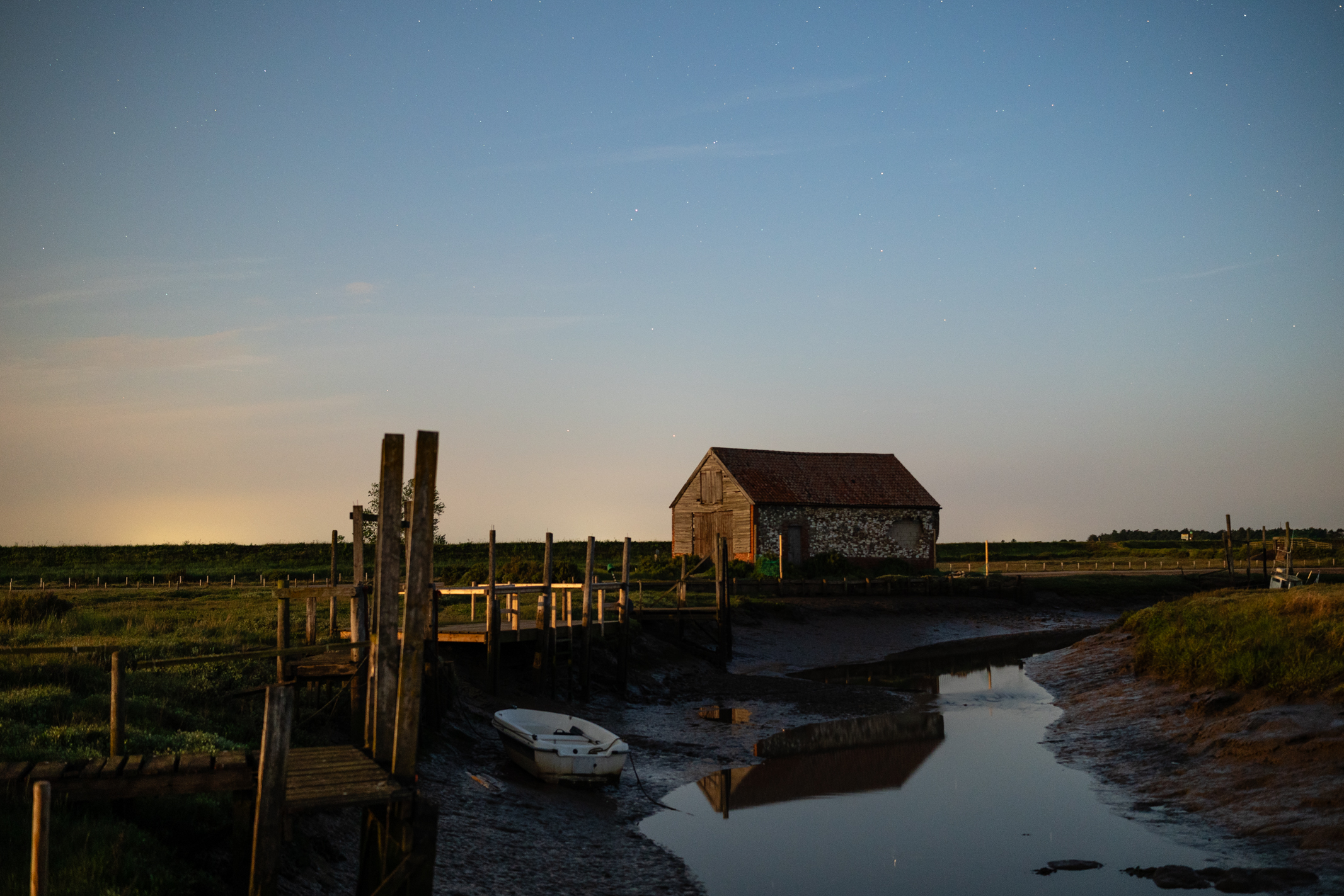 Photo of an old harbour taken with the Viltrox AF 27mm f/ 1.2 Pro under the June 2025 strawberry moon
