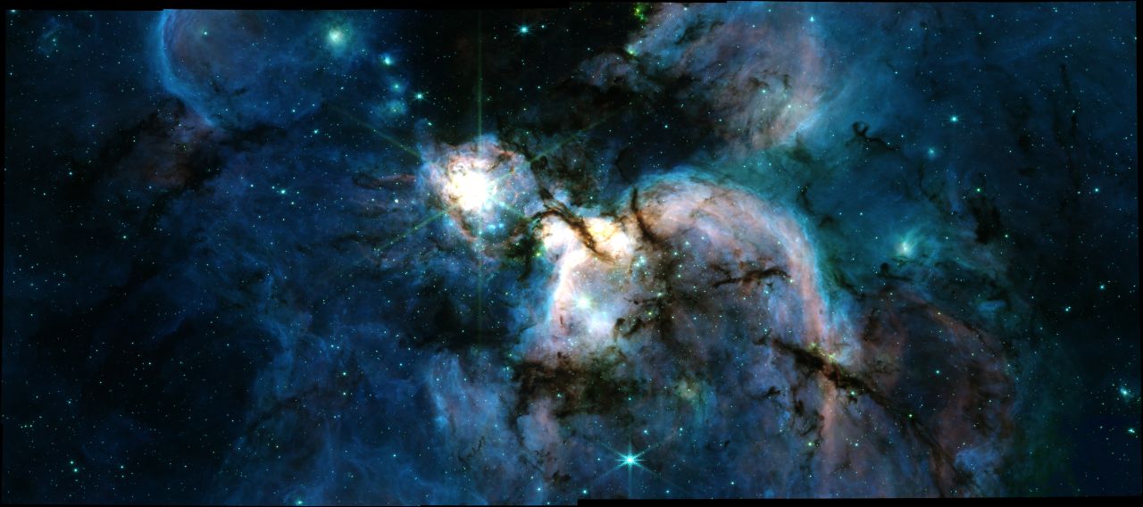 blue-and-white clouds of gas on a starry background